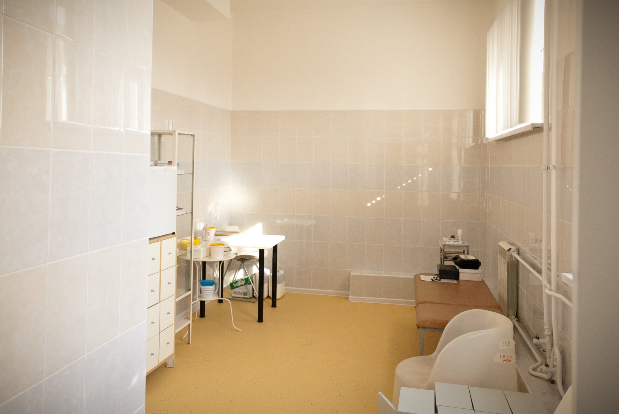 Medical room with equipment for monitoring and caring for children at school